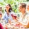 a group of people at an outdoor table - J Veridian Upper Dublin  Apartments in Fort Washington, PA